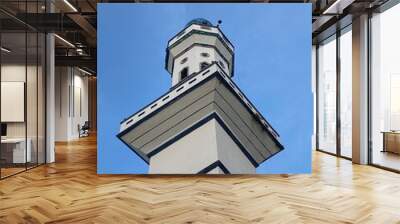 mosque pillar pole, Islamic religion and architecture concept, ornament of a mosque against blue sky. Wall mural