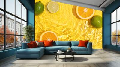 Colorful water background with lime and orange, food frame
 Wall mural