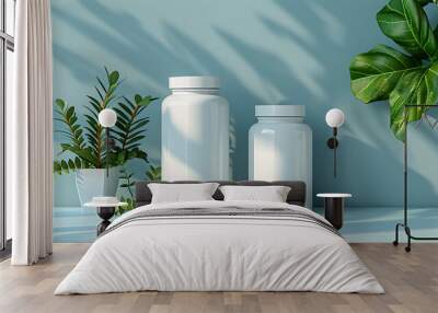 Two white bottles, one large and one small, sit on a blue table top. Green foliage surrounds them, and the bottles are in focus. Wall mural