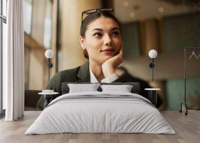 businesswoman working at office place Wall mural