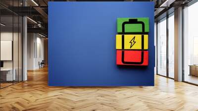 Wooden cubes with battery icon. Copy space for text. Mental health assessment, child wellness ,world mental health day, think positive, boost energy level concept Wall mural