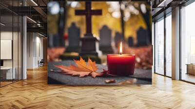 All Saints Day candle on the grave. Cemetery in November. Wall mural