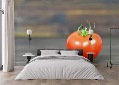 Tomato on wooden background Wall mural