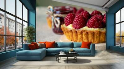 Raspberry cake and raspberry jam close-up Wall mural