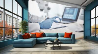 Science, research and hands in lab with notebook and computer on scientific analysis. Experiment, internet and analytics, scientist in laboratory with data, vision and future in medical innovation. Wall mural