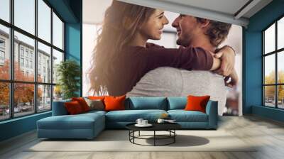 woman, man and hug for love, care and quality time together with commitment to relationship at home. Wall mural