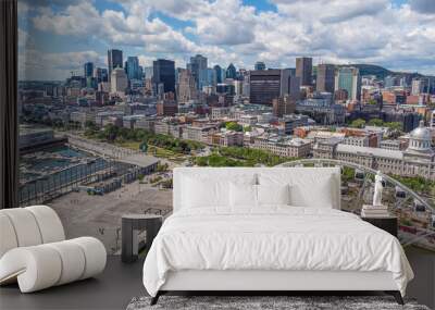 Aerial panoramic view of downtown Montreal financial district and the historic old port on a summer day, Mount Royal mountain in the backdrop, Quebec, Canada. Photo taken by drone in August 2021. Wall mural