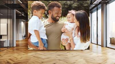 Black family, happy and nature park with people holding a child and baby outdoor. Mother, father and children together in the summer sun with happiness smile and kids spending quality time outdoors Wall mural