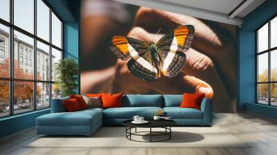 butterfly on hand Wall mural