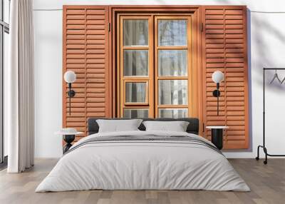 Antique wooden brown window with shutters against a white wall. Oginsky Palace, Smorgon district, Belarus Wall mural