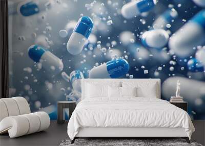 Blue and white pills flying in the air. Wall mural