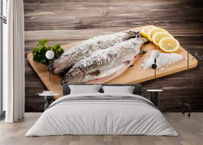 Fresh raw trouts on cutting board Wall mural