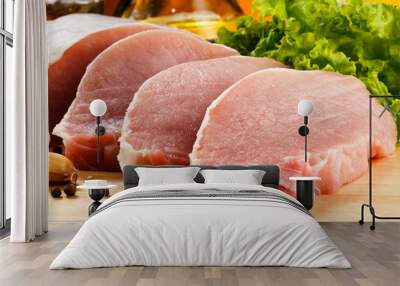 Raw pork on cutting board and vegetables Wall mural