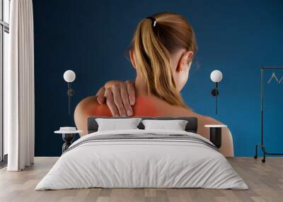 woman massaging pain back Wall mural