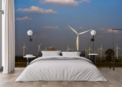 Group of wind turbines in the field for sustainability and green energy  Wall mural