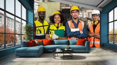 Photo group of diversity engineer worker teammates in factory Wall mural