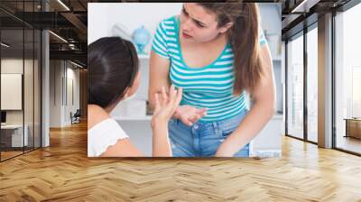 Adolescent girls finding out relationship at home Wall mural