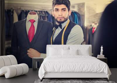 Adult man is creating business image with red tie Wall mural