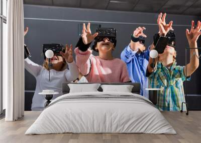 Emotional tween kids having fun with vr headset goggles. Generation Alpha and new technology Wall mural