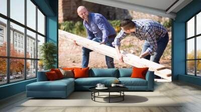 Farmers working with construction materials Wall mural