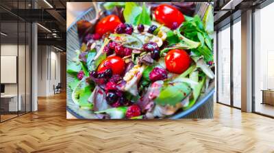 Healthy vegetables and berries salad Wall mural