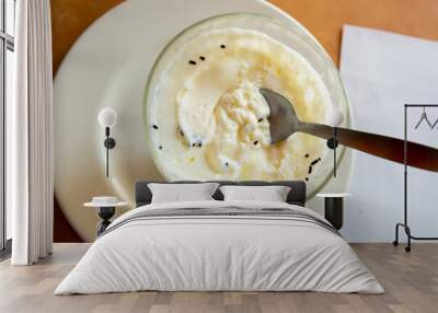 Image of tasty creamy mousse served at plate with spoon, nobody.. Wall mural