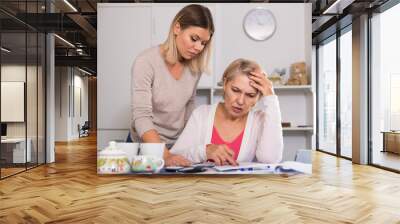 mother and her adult daughter with financial problems Wall mural