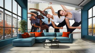 People doing stretching exercises Wall mural