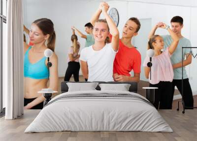 Teenage boys and girls training slow foxtrot Wall mural