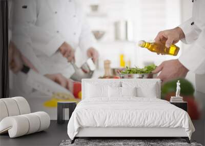 anonymous hands preparing food in professional kitchen Wall mural