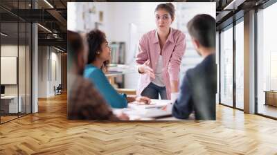 meeting office. young woman presents her project to her colleagues Wall mural