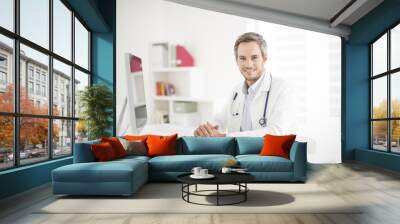 young doctor at his office Wall mural