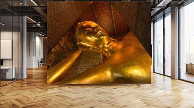 Reclining Buddha gold statue. Wat Pho, Bangkok, Thailand Wall mural