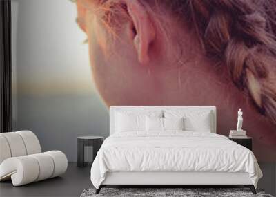 woman looking at sunset  Wall mural