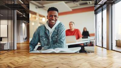 African student sitting in classroom Wall mural