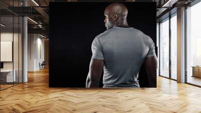 Afro american fitness model looking at copy space Wall mural