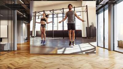 Athletes training hard at the gym Wall mural