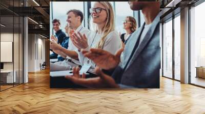 Business professionals applauding at a seminar Wall mural