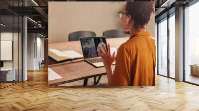 Business woman planning work on an online business meeting on Zoom Wall mural