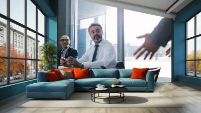 Businessman during a meeting in office Wall mural