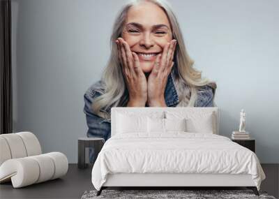 Cheerful senior woman Wall mural