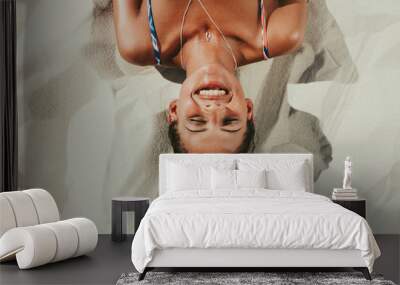 Close up of woman relaxing on beach sand Wall mural