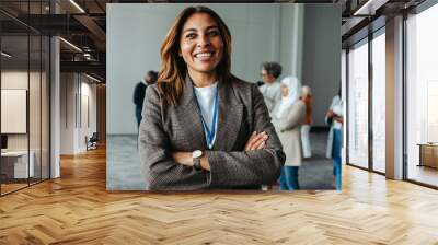 Confident woman leader at business conference in office environment Wall mural