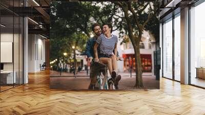 Couple enjoying a day together Wall mural