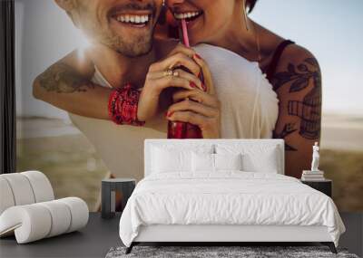 Couple having great summer holidays Wall mural