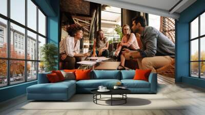 Creative people having a meeting in modern office Wall mural