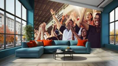 crowd of sports fans cheering during a match in stadium Wall mural