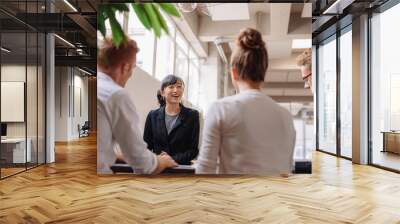 Diverse group of business people having meeting Wall mural