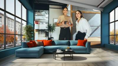 Female entrepreneurs smiling at the camera Wall mural