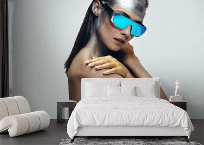 Female model in avant garde look Wall mural